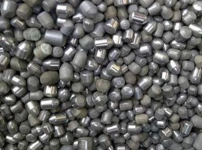 Scrap tungsten carbide rock drilling compacts, such as rotary cone inserts, hammer bit buttons, and stabilizers